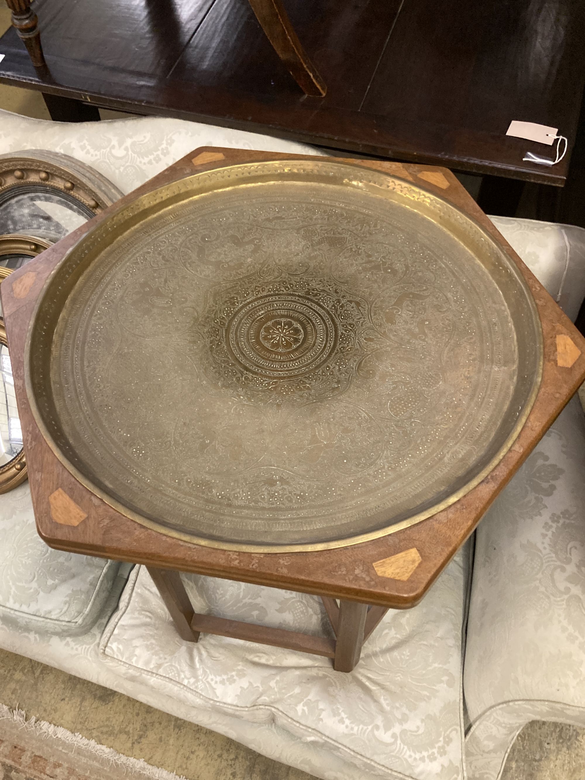 An Indian hexagonal brass tray top occasional table, width 60cm, depth 70cm, height 55cm together with a Victorian aesthetic movement r